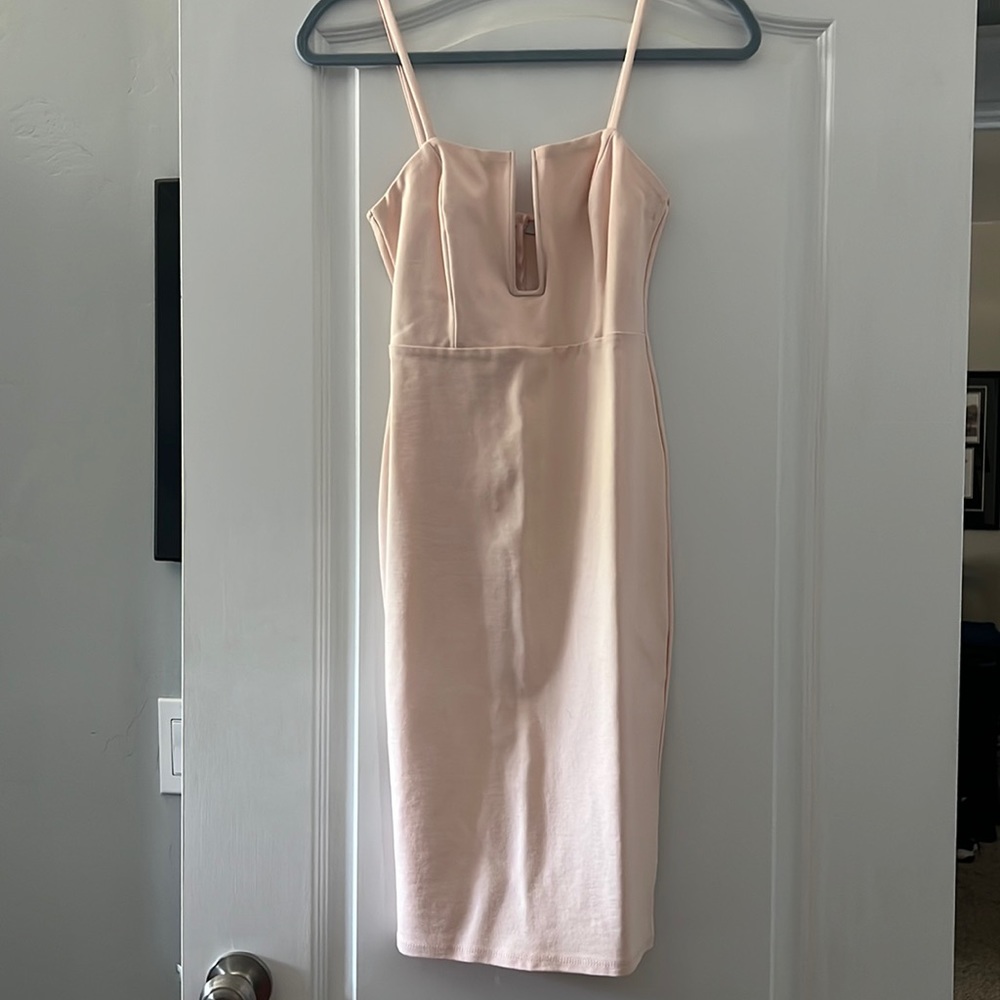 Spaghetti strap pink dress with plunge neckline
